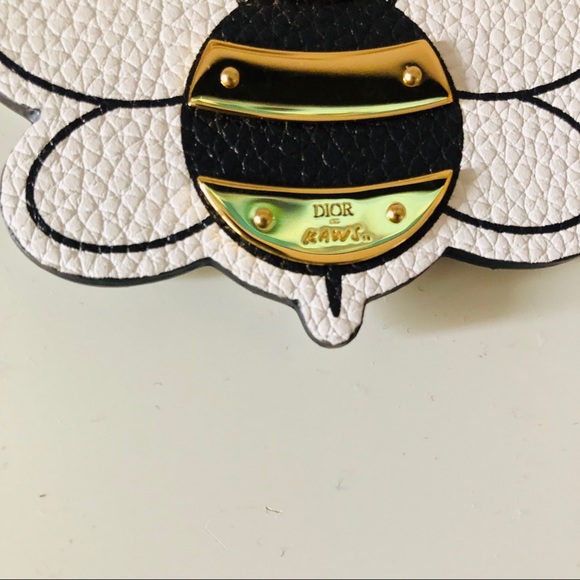 Kaws x Dior gold and leather keychain. - Picture 3 of 3